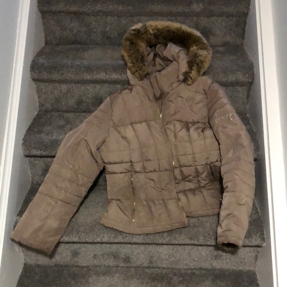 Woman’s coat worn a few times. For woman or young teen.